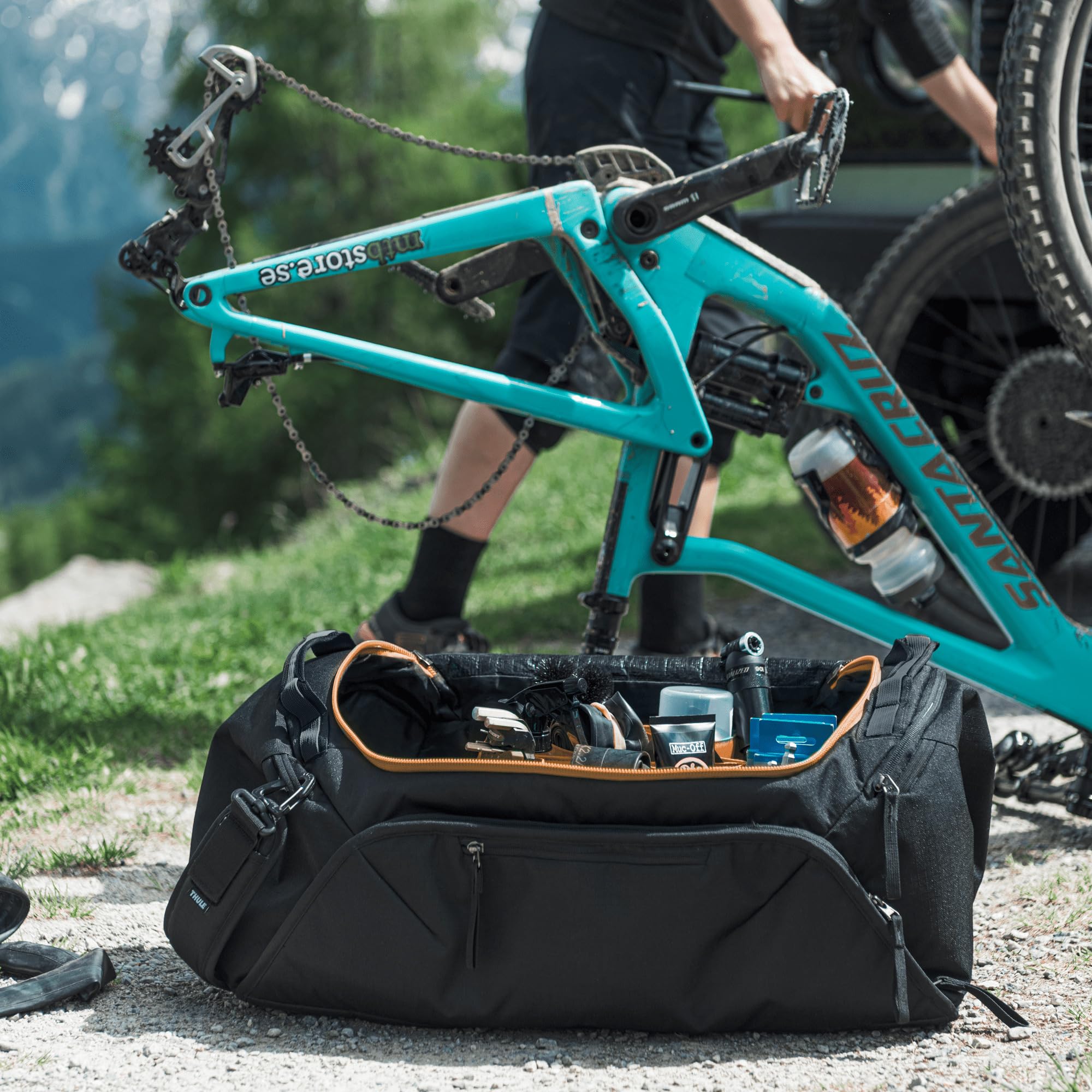Thule RoundTrip in a car trunk ready for trip organization and transport