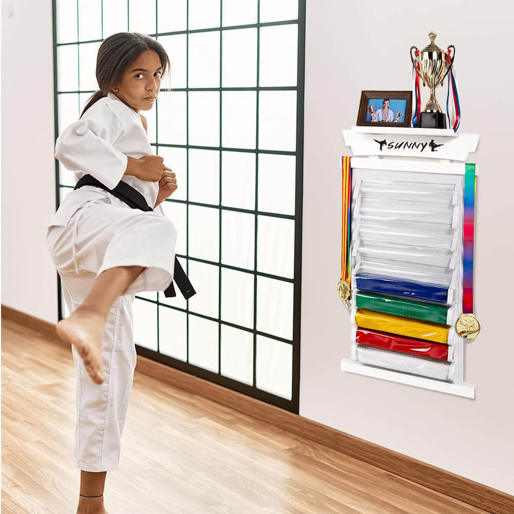 Tilhumt rack next to folded belts to show capacity and scale for belt storage benefit