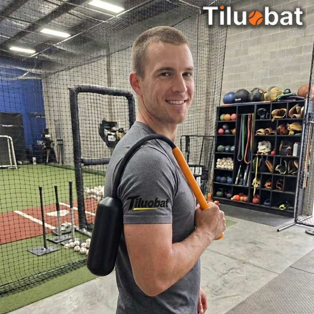 Tiluobat bat next to a standard baseball bat for scale, fits 26 to 34 inch bats