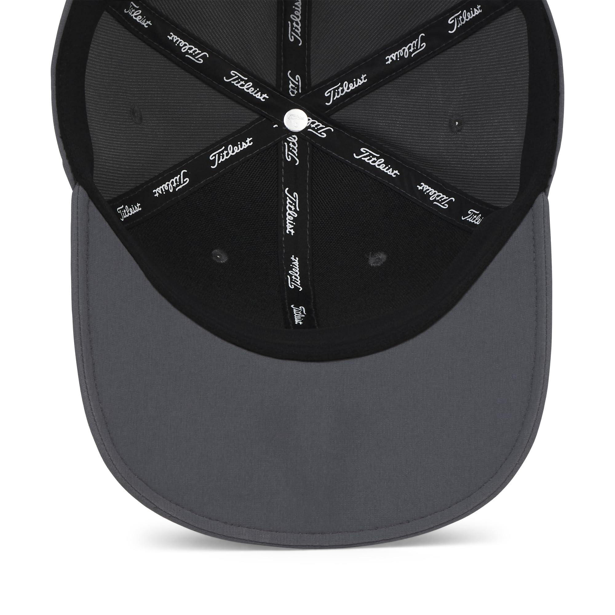 Titleist hat beside golf ball showing size and curved bill scale benefits