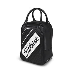 Titleist shag bag beside a golf bucket to show compact size and capacity