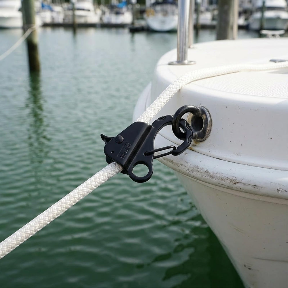 Tlence anchor hook in use on pontoon docking showing stable, hands-free line control