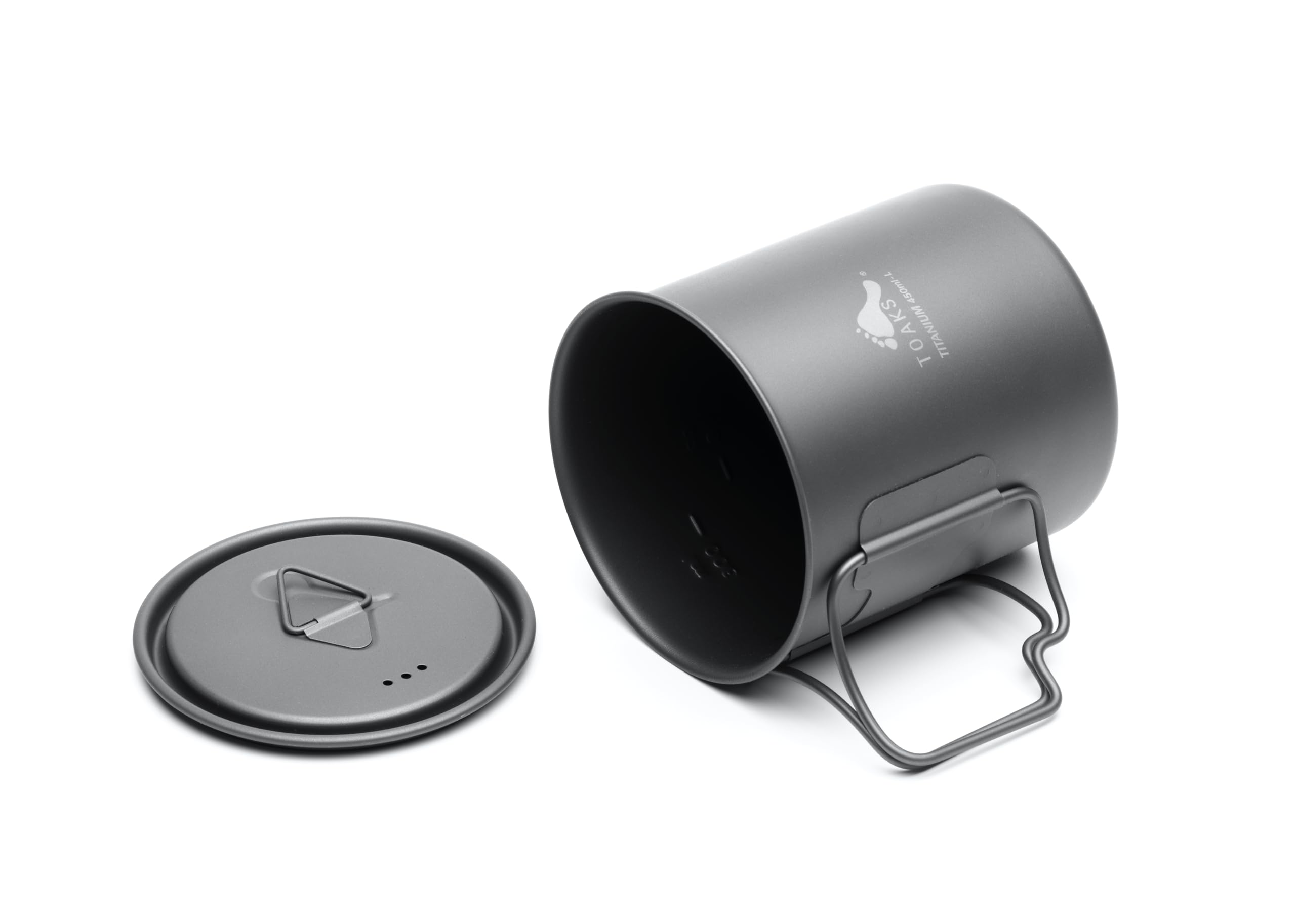 TOAKS close detail of folding handle showing secure grip and space-saving benefit