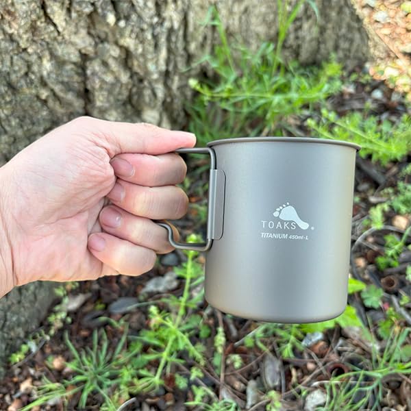 TOAKS cup nested inside a pot showing efficient packability and nesting benefit