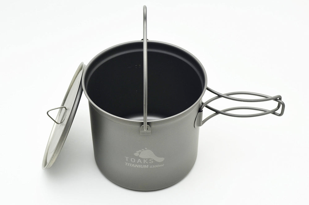 TOAKS bail handle close-up demonstrating secure grip and hanging capability