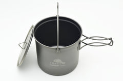 TOAKS bail handle close-up demonstrating secure grip and hanging capability