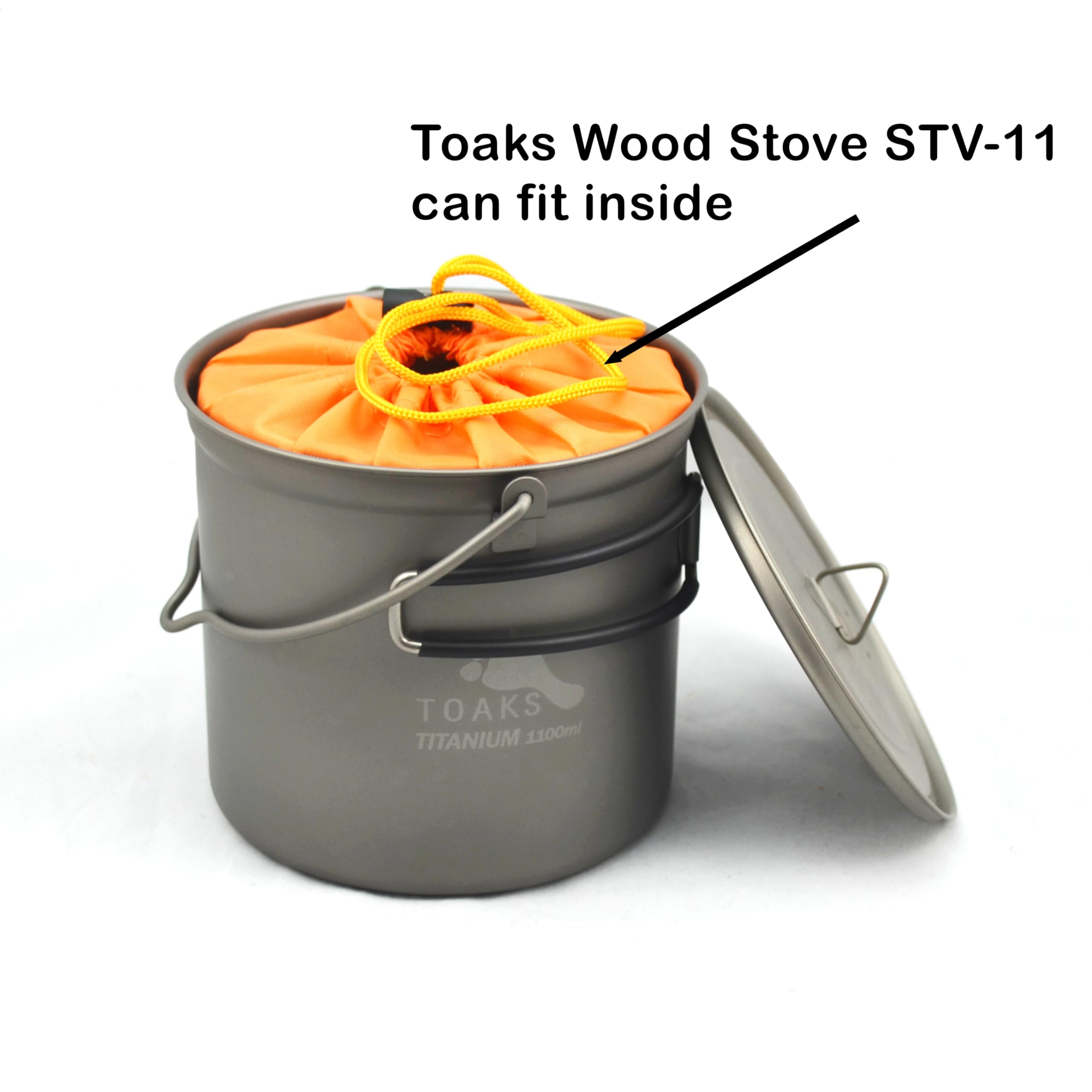 TOAKS pot beside a gas canister showing fit and space-saving storage