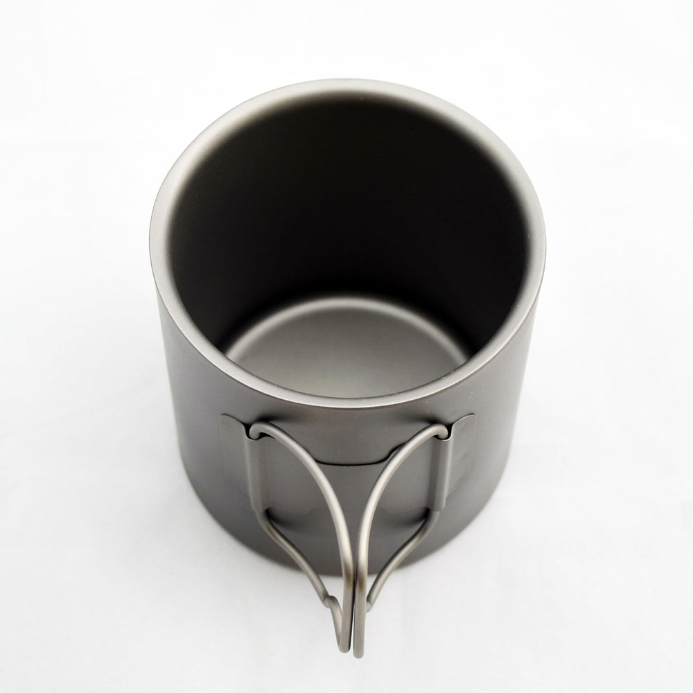 TOAKS cup nested with pot demonstrating space-saving camp cookware packing