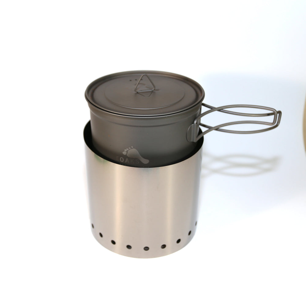 TOAKS pot on camp stove outdoors illustrating reliable backcountry meal preparation