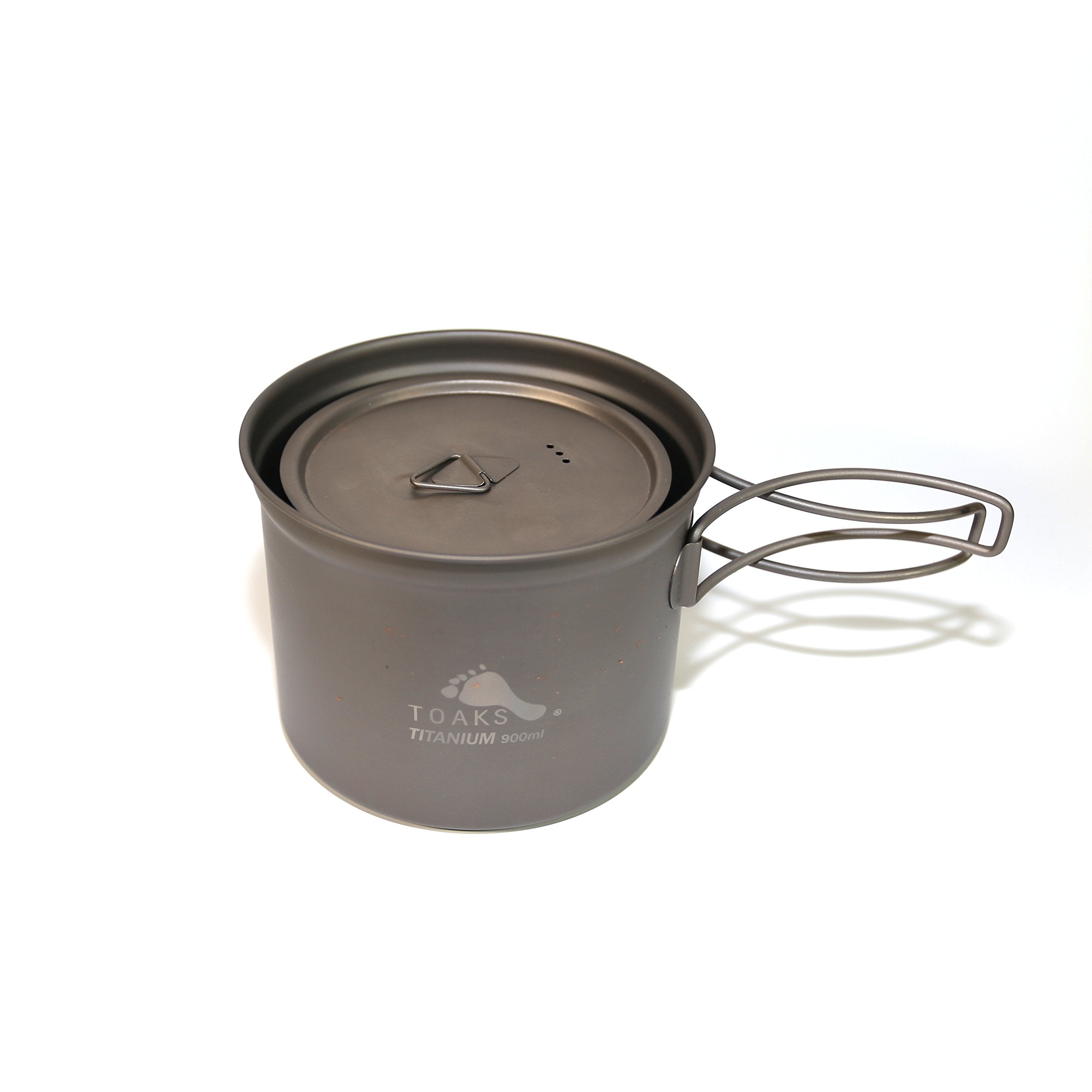 TOAKS pot packed with small stove and canister demonstrating space-saving packing