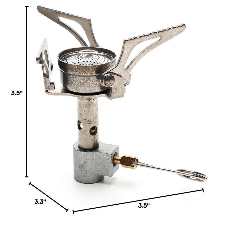 TOAKS titanium stove on campsite showing rugged durability and trail-ready convenience