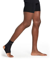 Tommie Copper sleeve worn inside shoe demonstrating low-profile fit