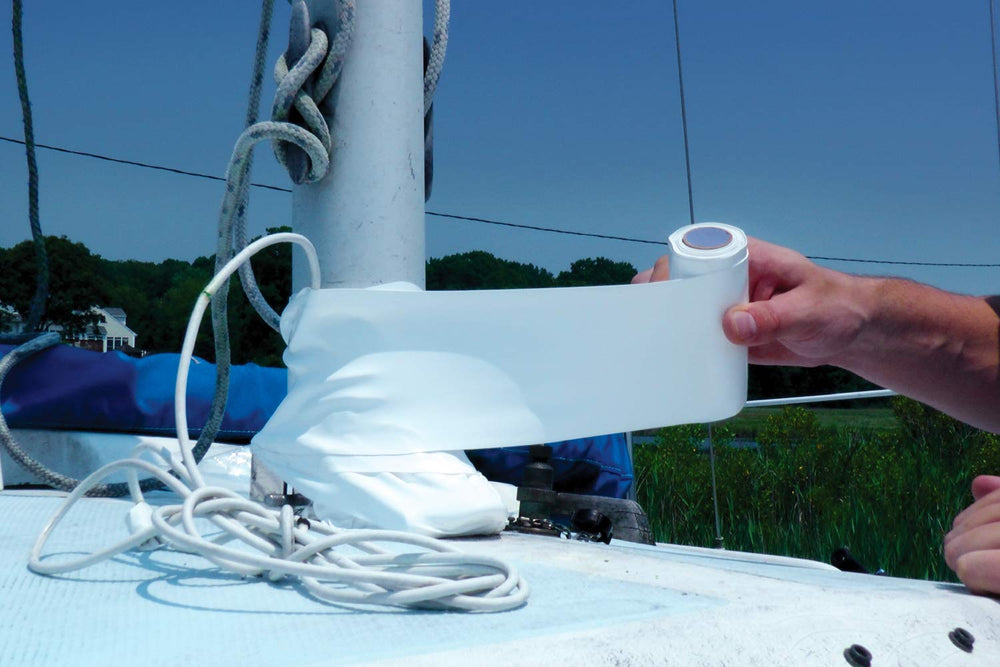 Tommy Tape installed on a keel-stepped mast in harbor showing watertight seal and neat finish