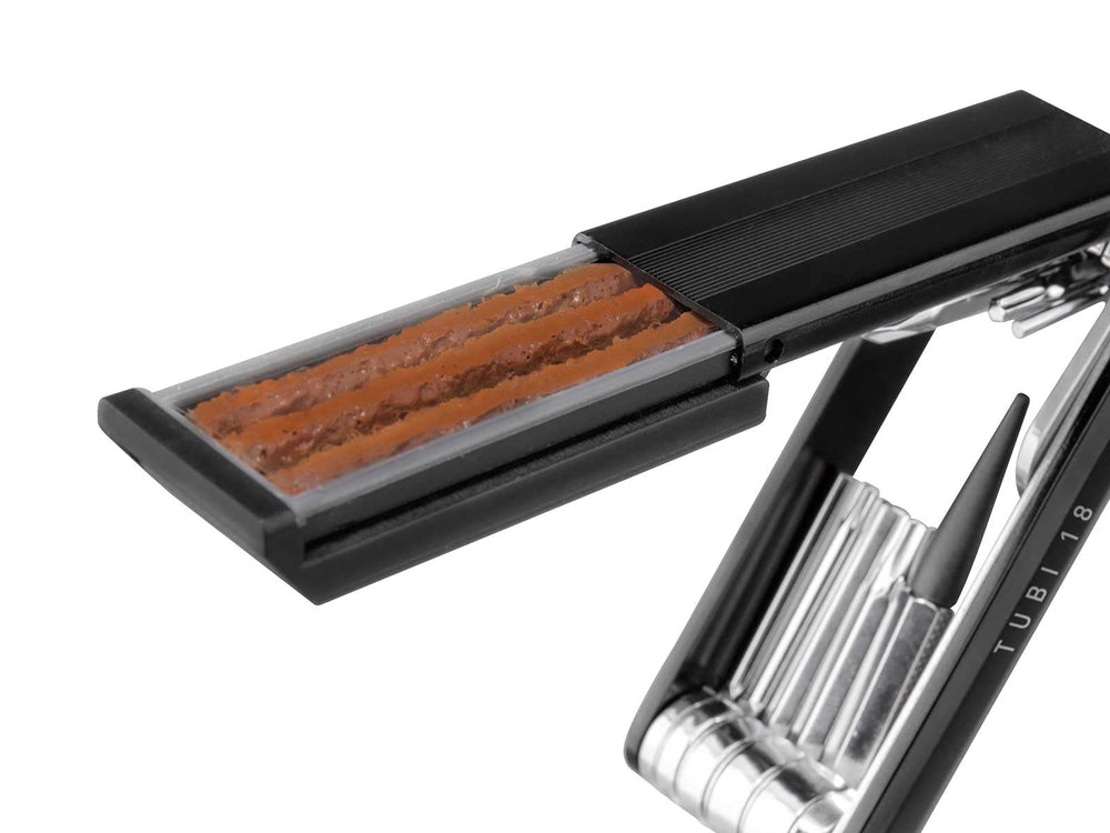 Topeak Tubi 18 close-up of chrome vanadium tools and serrated knife for reliable repairs