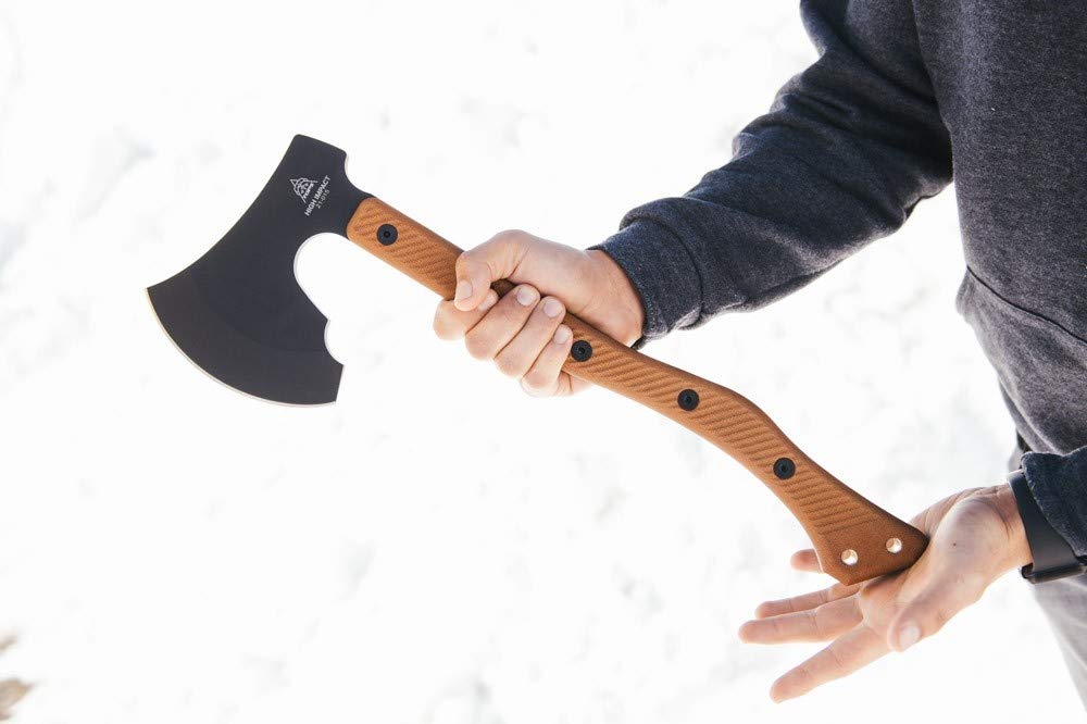 TOPS axe splitting camp firewood illustrating reliable chopping performance outdoors