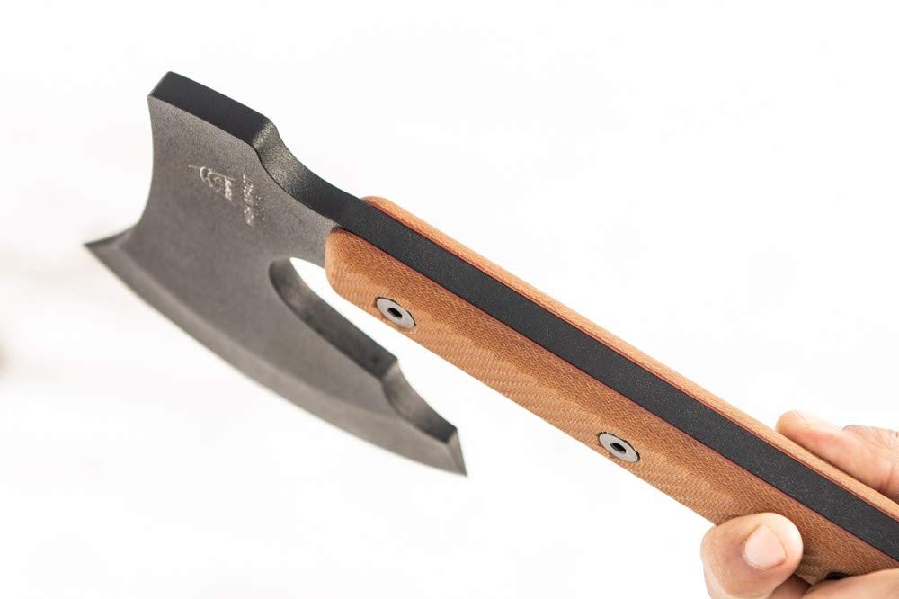 TOPS axe with sheath, sticker, catalog and oil showing included accessories for maintenance