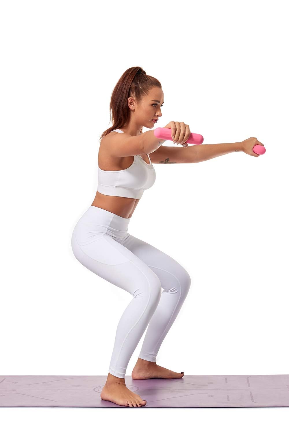 TOSAMC lifestyle image during yoga session adding light resistance for tone and control