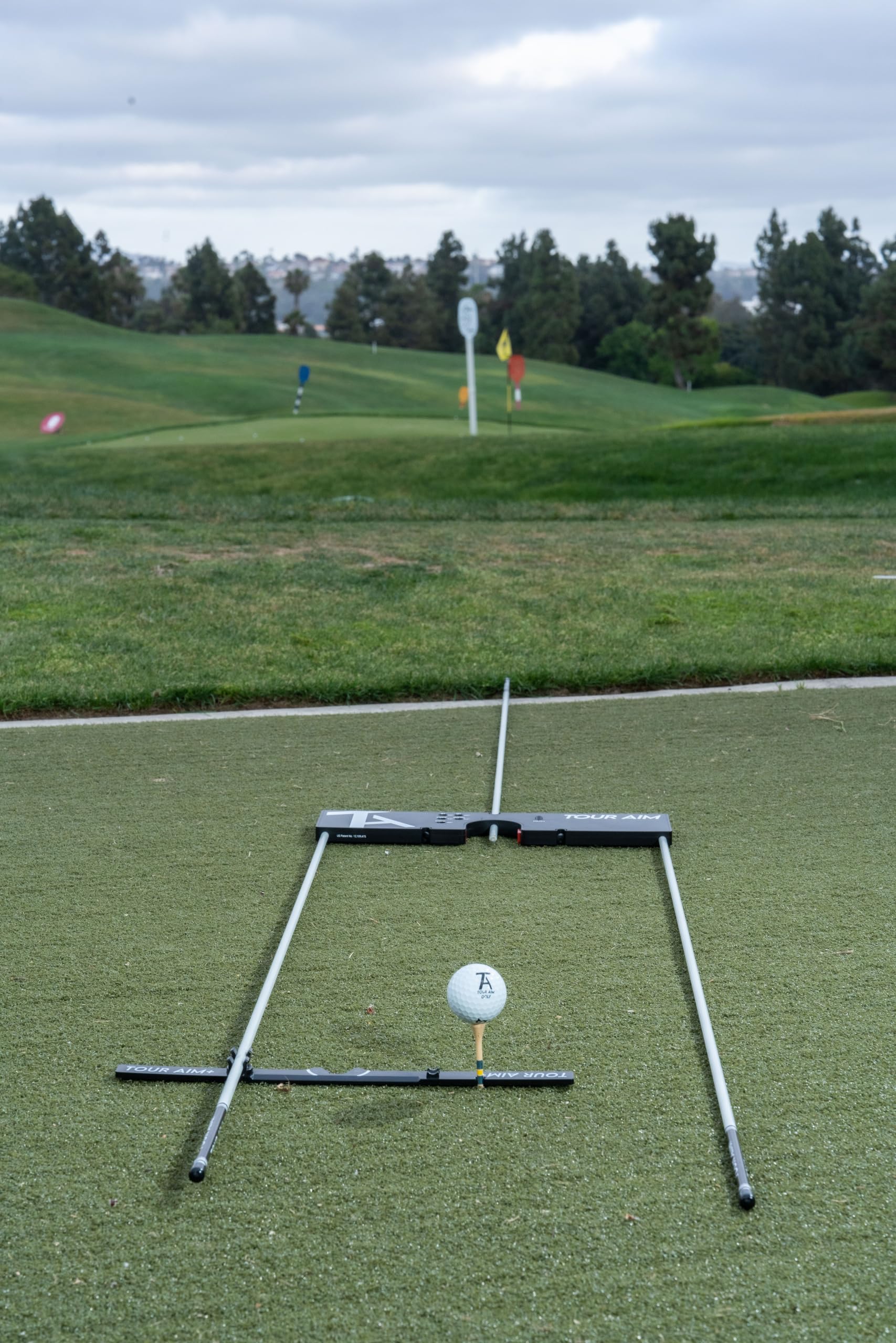 Tour Aim paired with alignment sticks creating precise target lines