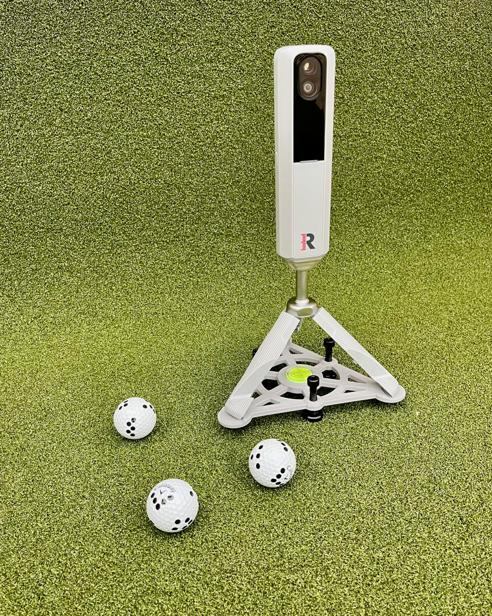 Tower Golf close-up of bubble level enabling precise Rapsodo alignment and accuracy
