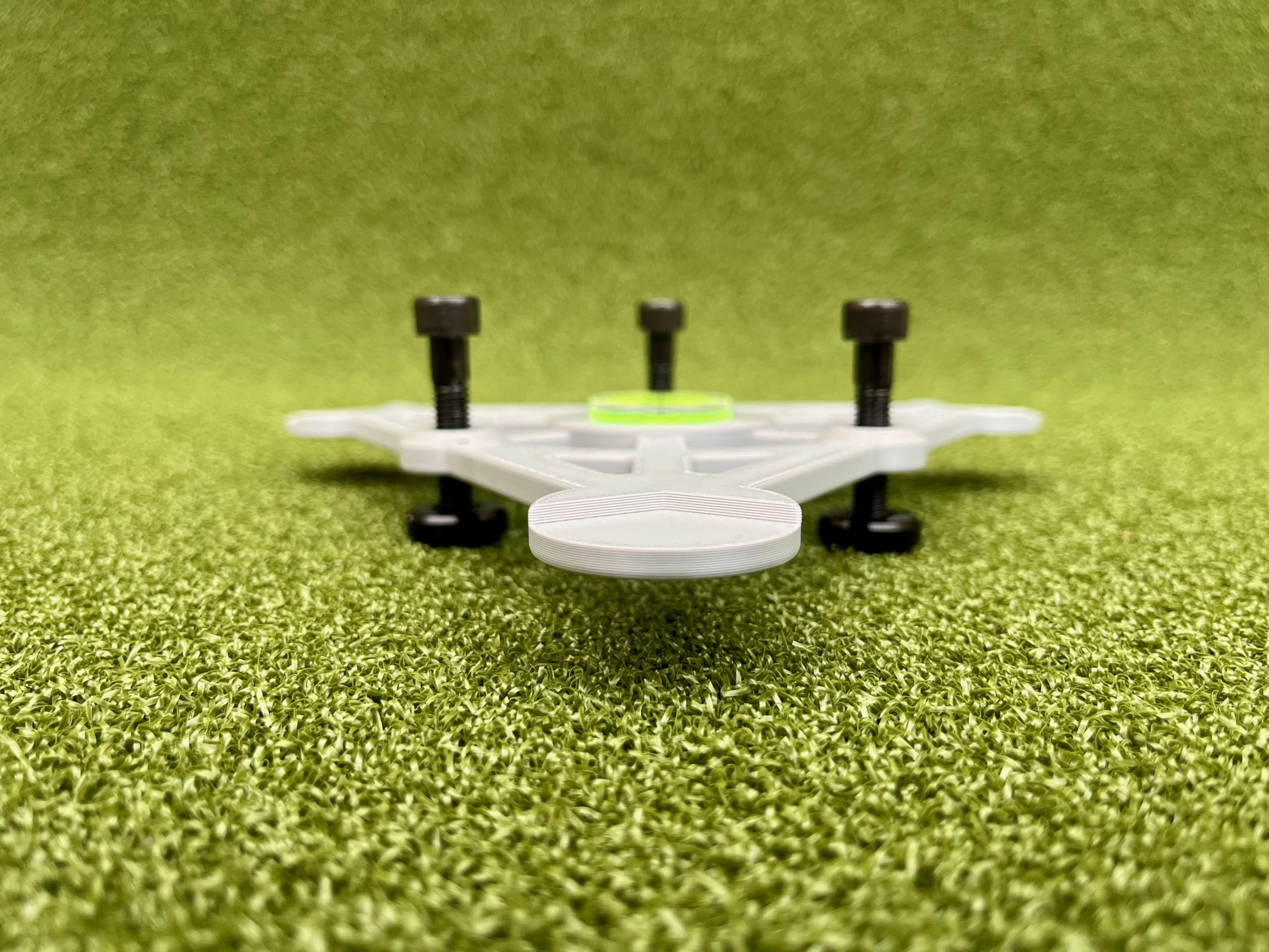 Tower Golf on simulator mat with Rapsodo highlighting reliable indoor setup