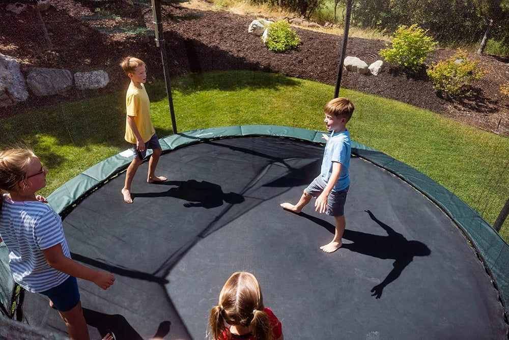 Trampoline Pro mat next to tape measure showing 159 inch diameter fit