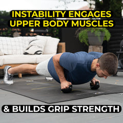 Person using TRX Push-It for push-ups increasing range of motion benefit