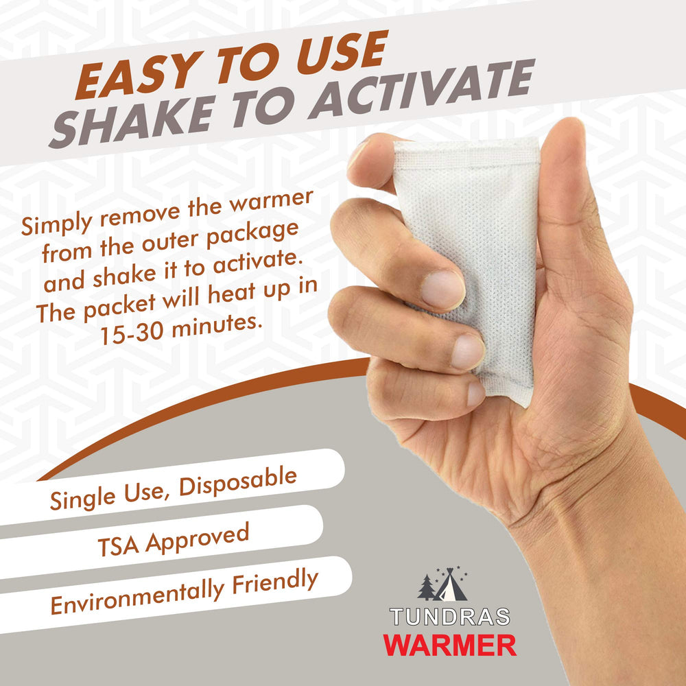 Tundras warmer next to hand for scale showing compact portable size