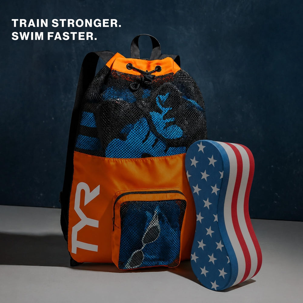 TYR pull float next to hand for size scale and quick transport benefit