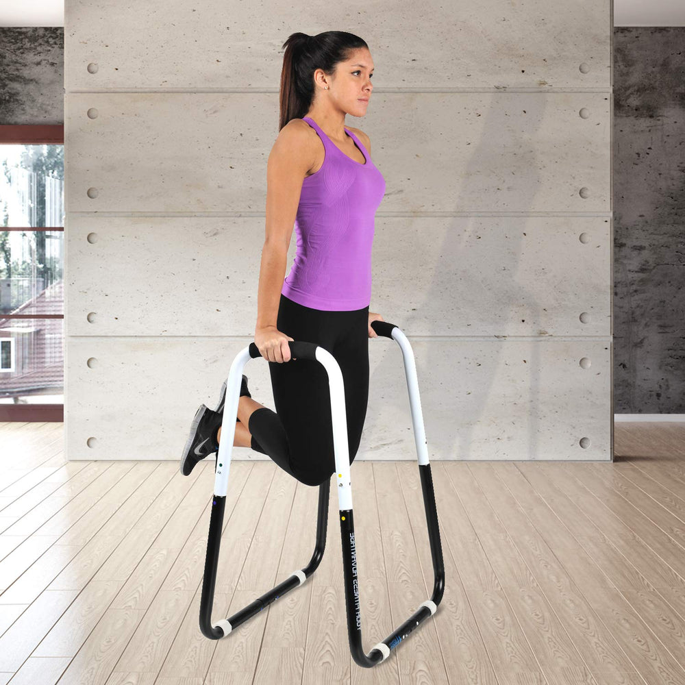 Ultimate Body Press performing knee raises showing core strengthening benefit