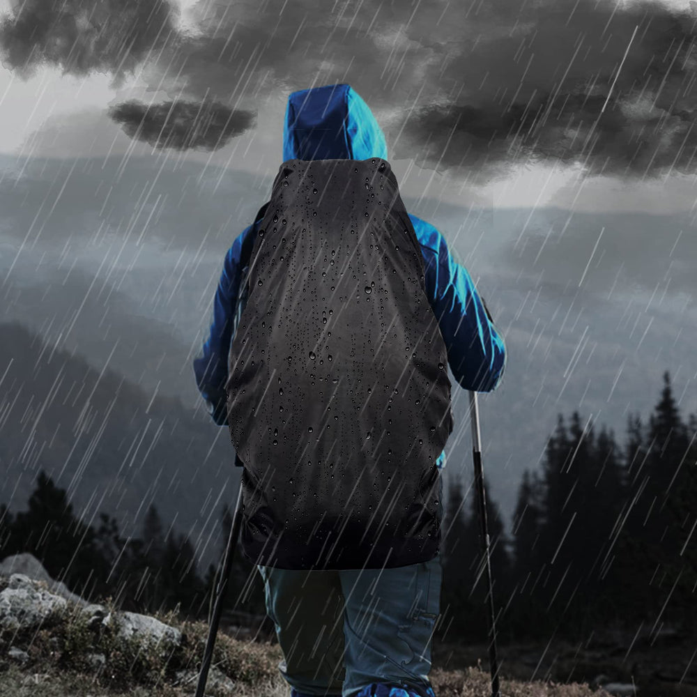Unineovo pack with rain cover on trail protecting gear from wet weather