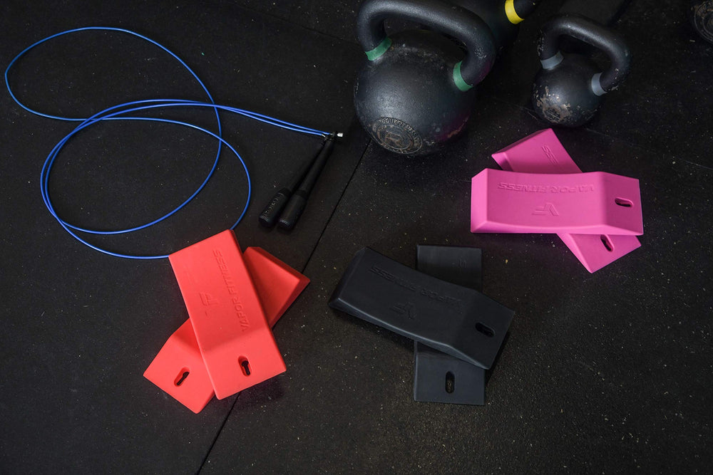 Vapor Fitness wedges set on a deadlift platform for balanced loading setup