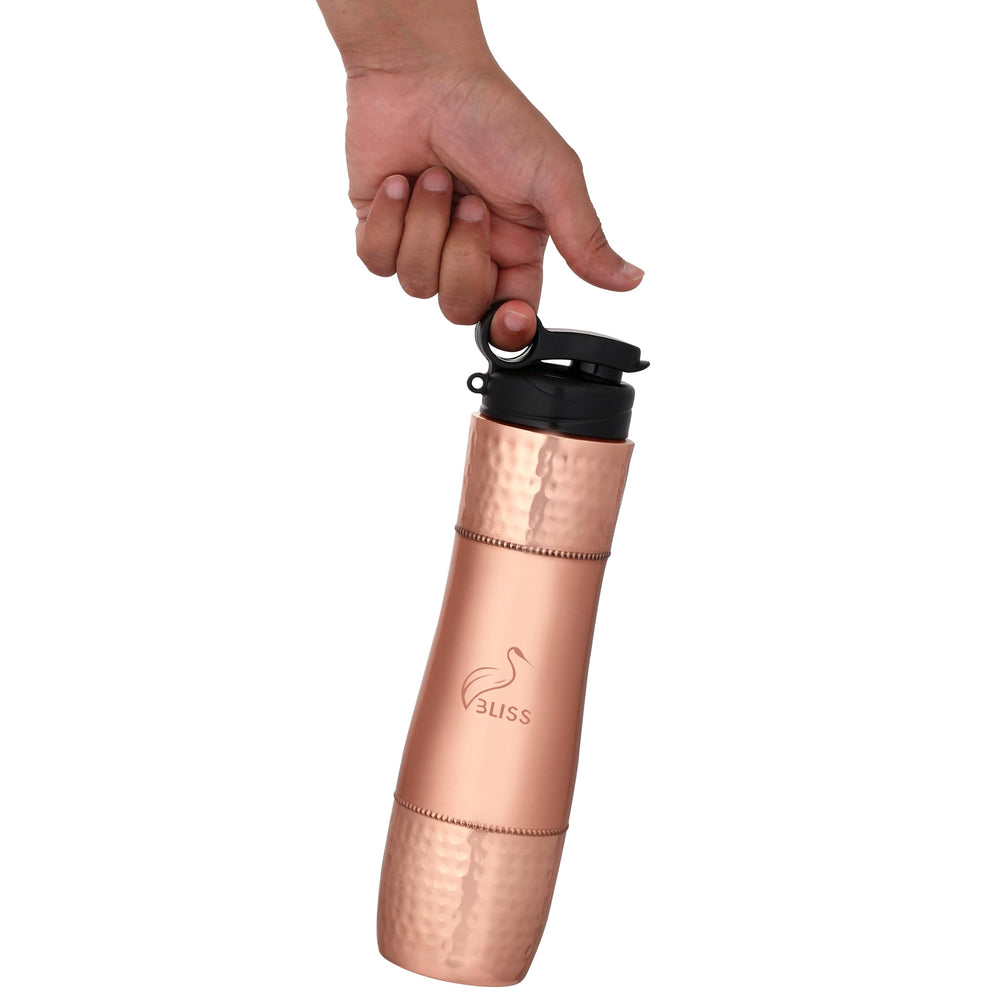VBLISS pouring water to demonstrate wide-mouth fill and pour control benefit
