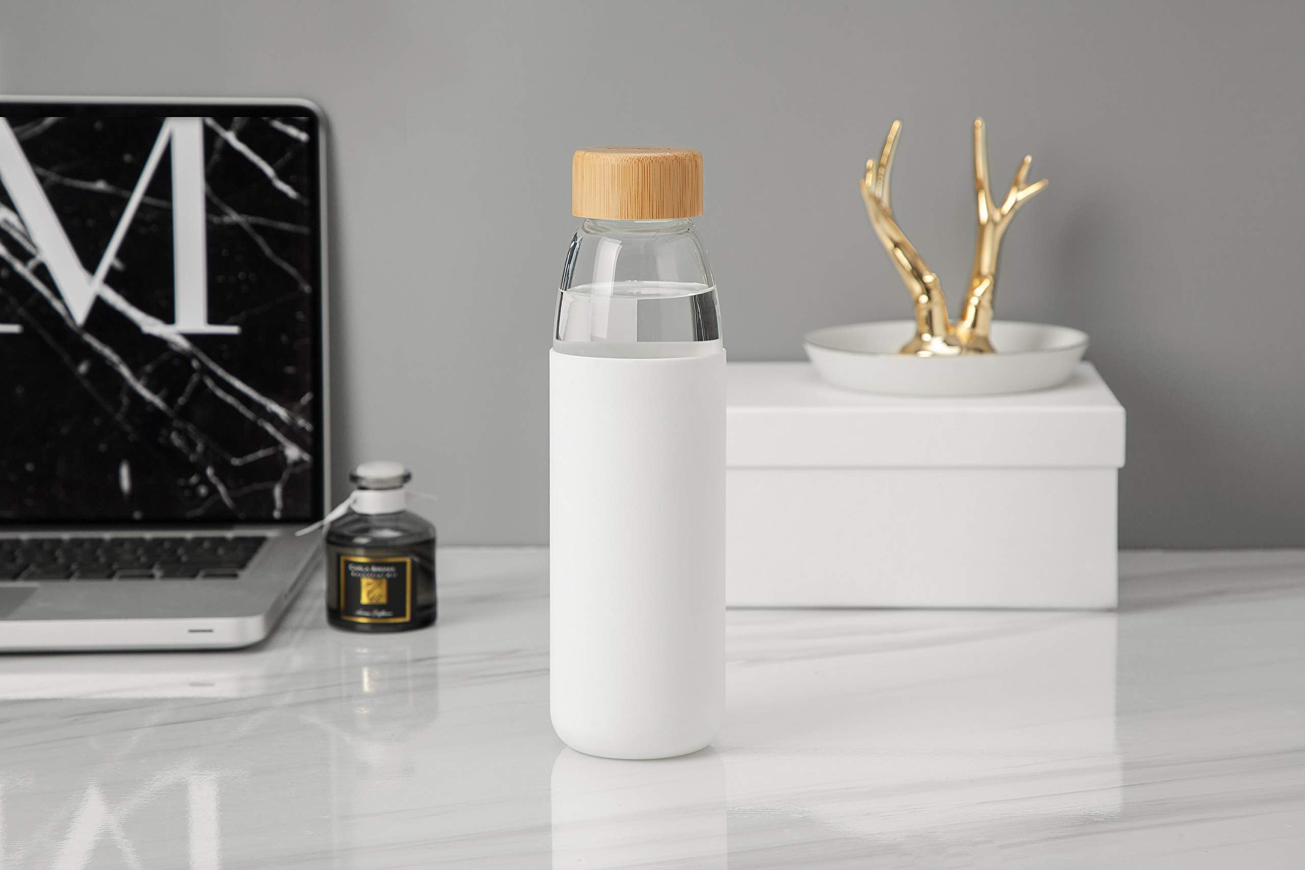 veegoal bottle placed in car cup holder demonstrating travel convenience