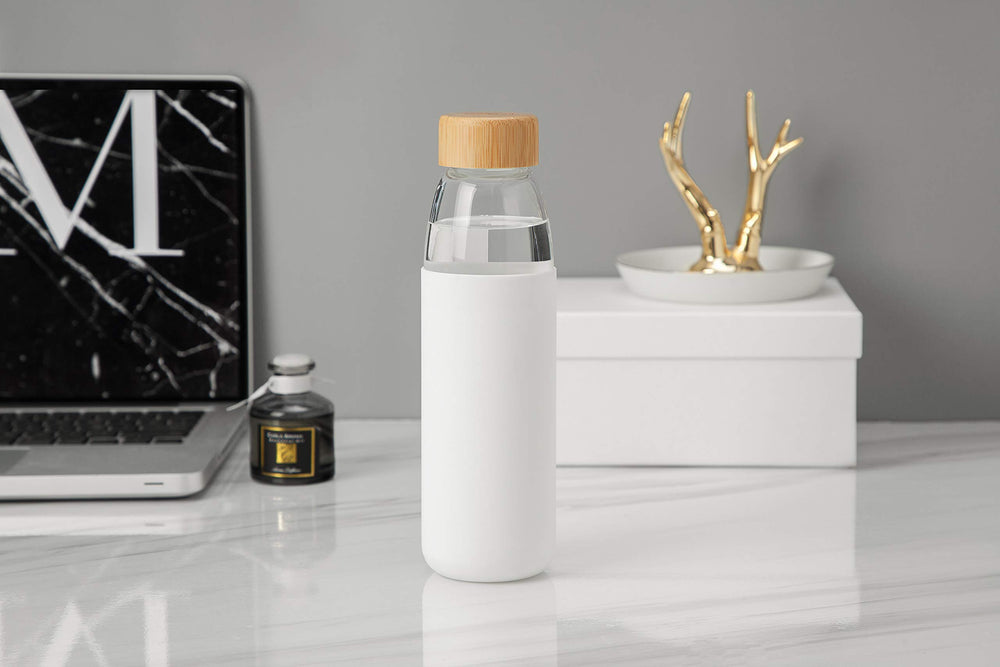 veegoal bottle placed in car cup holder demonstrating travel convenience