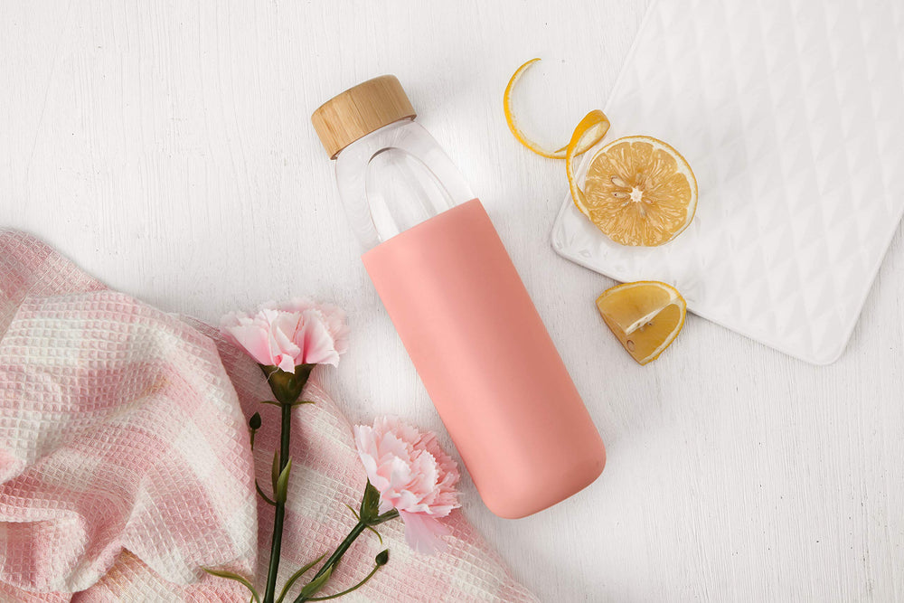 veegoal bottle in cup holder demonstrating 18 oz size and convenient on‑the‑go fit