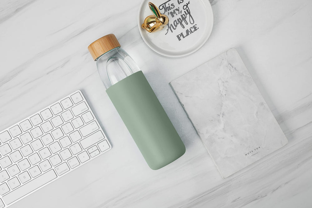 veegoal bottle with bamboo lid on desk lifestyle scene for stylish everyday use