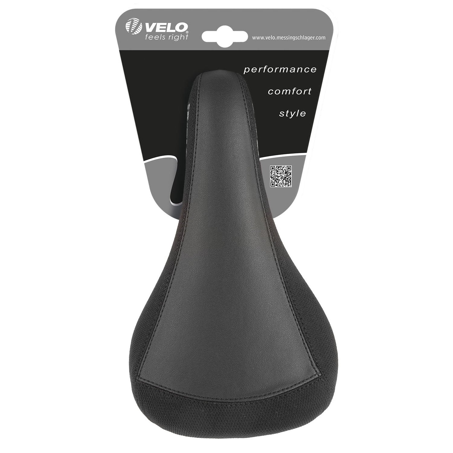 VELO saddle next to ruler showing 247x137mm size for precise fit benefit