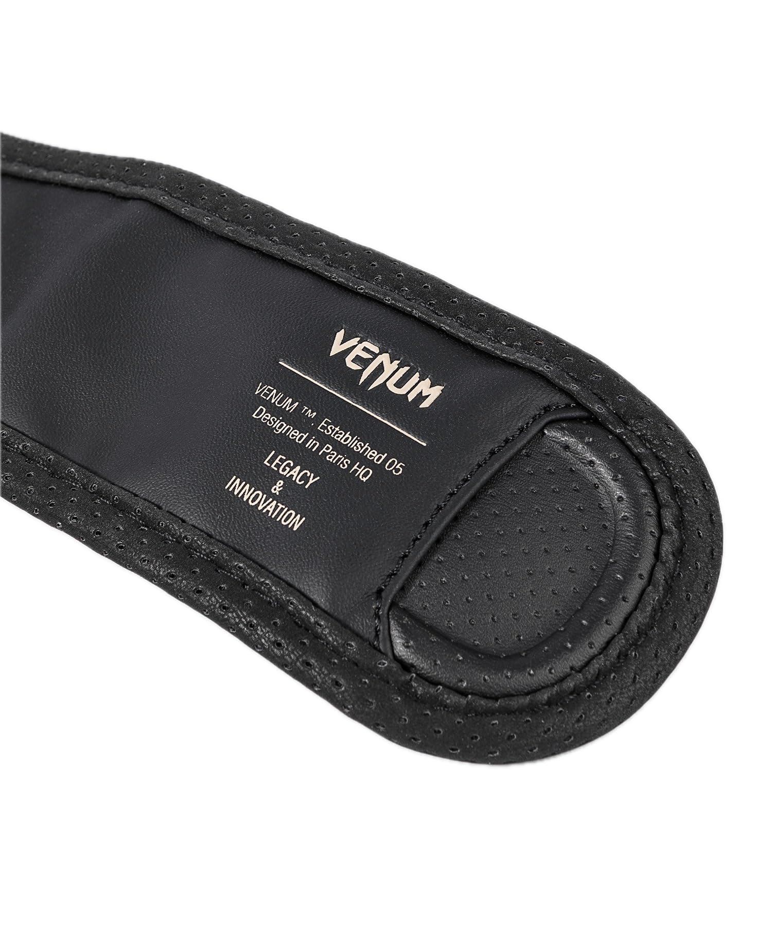 Venum Impact Evo beside ruler and box showing size and packaging clarity