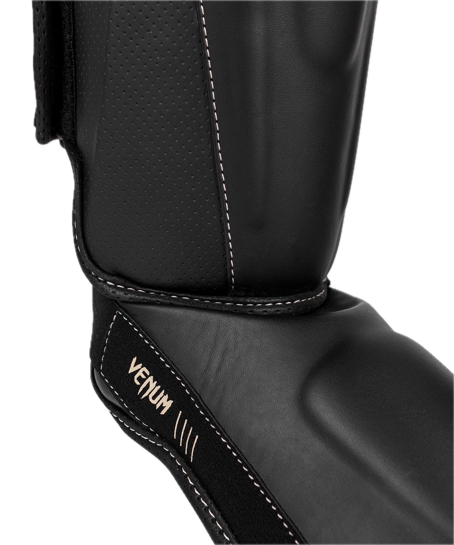 Venum Impact Evo instep detail showing padding and secure foot protection