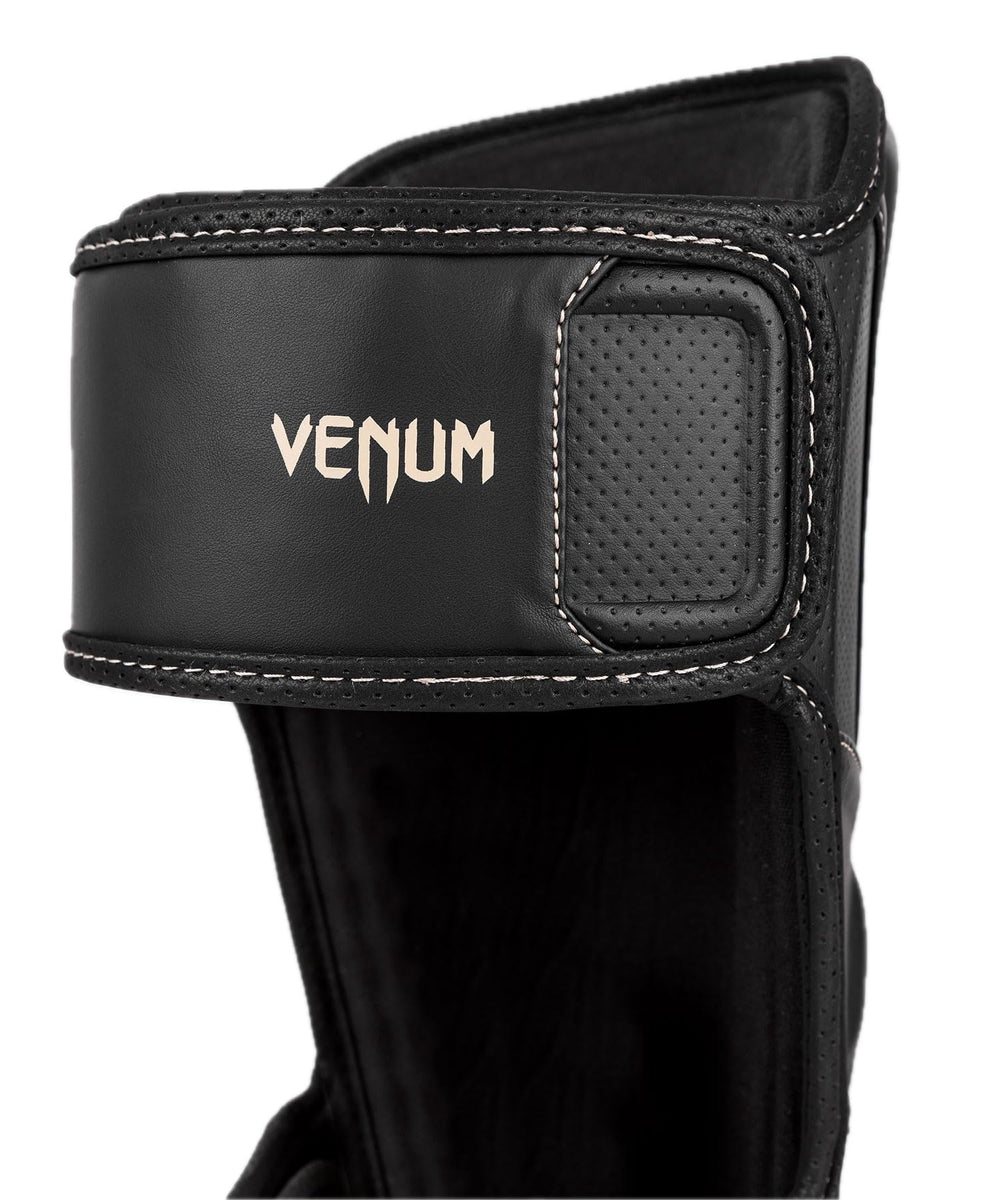 Venum Impact Evo detail of instep reinforcement highlighting foot impact defense