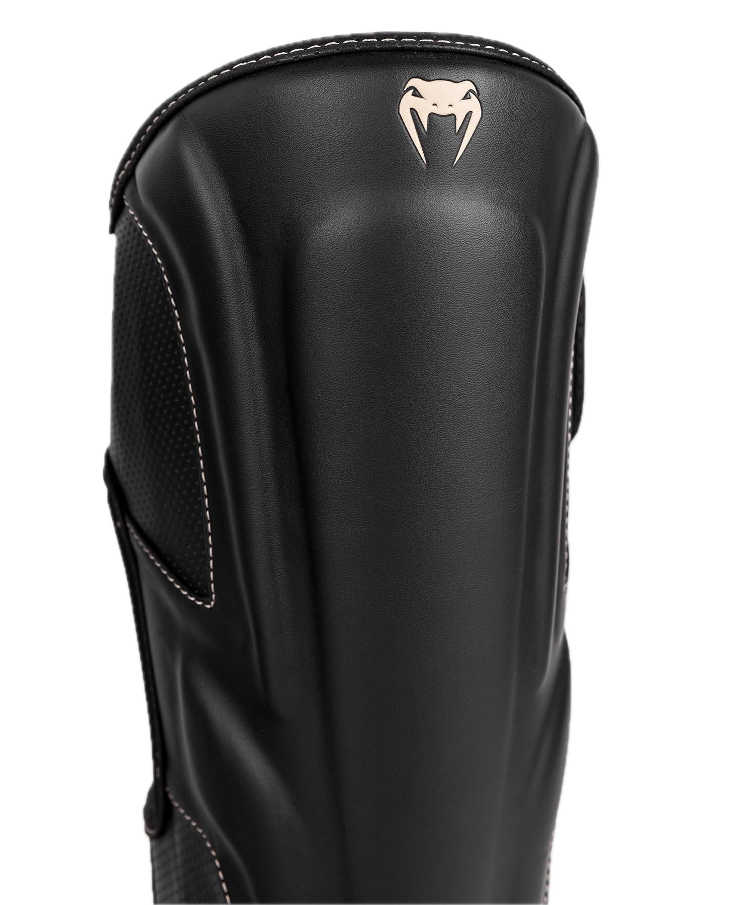 Venum Impact Evo beside gym bag in training setting signifying durable daily use