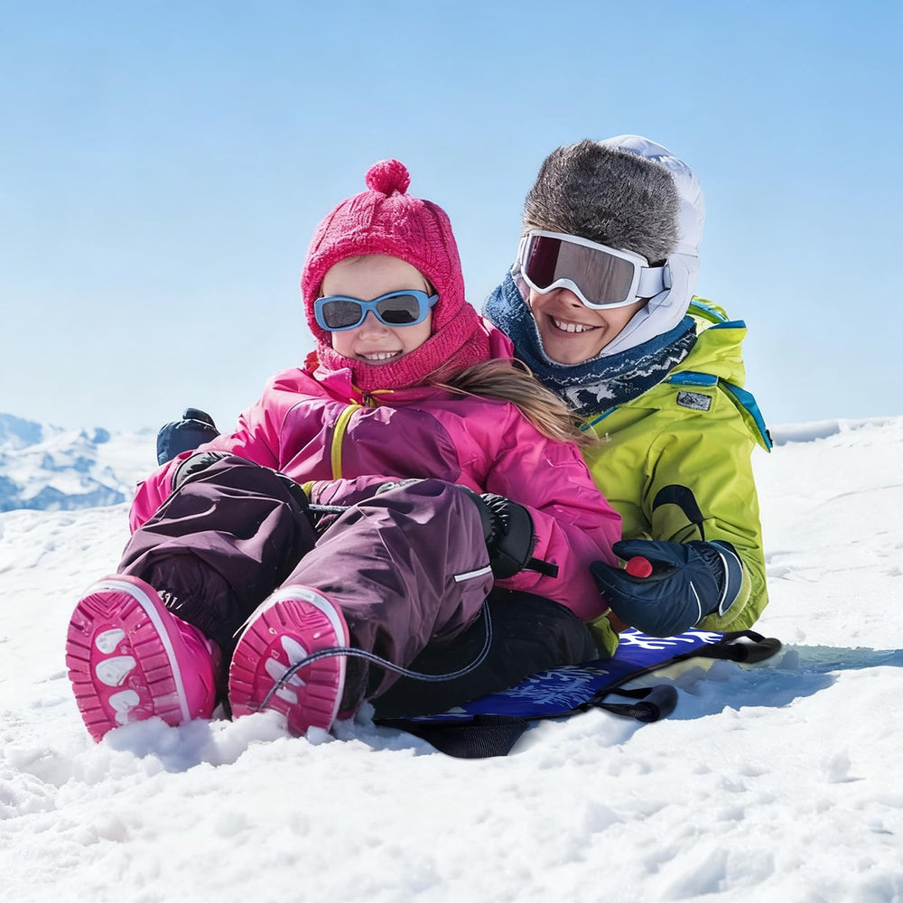 Vertintong sled in use on powder slope delivering controlled steering
