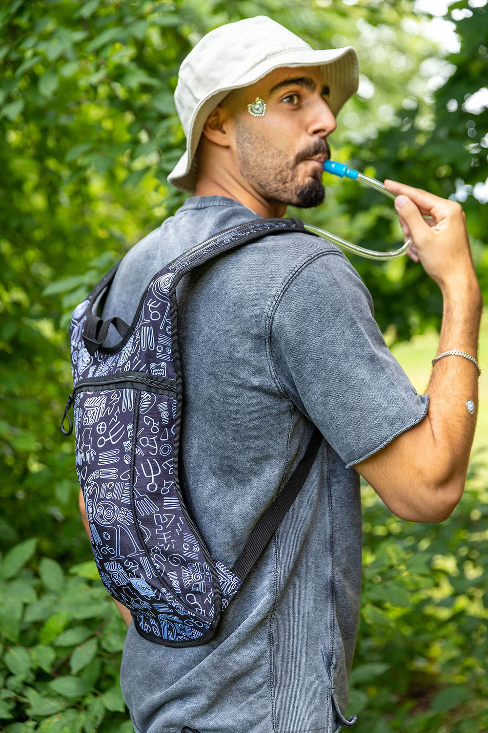 Vibe Festival Gear worn at an outdoor festival showing hands-free hydration and convenience during events