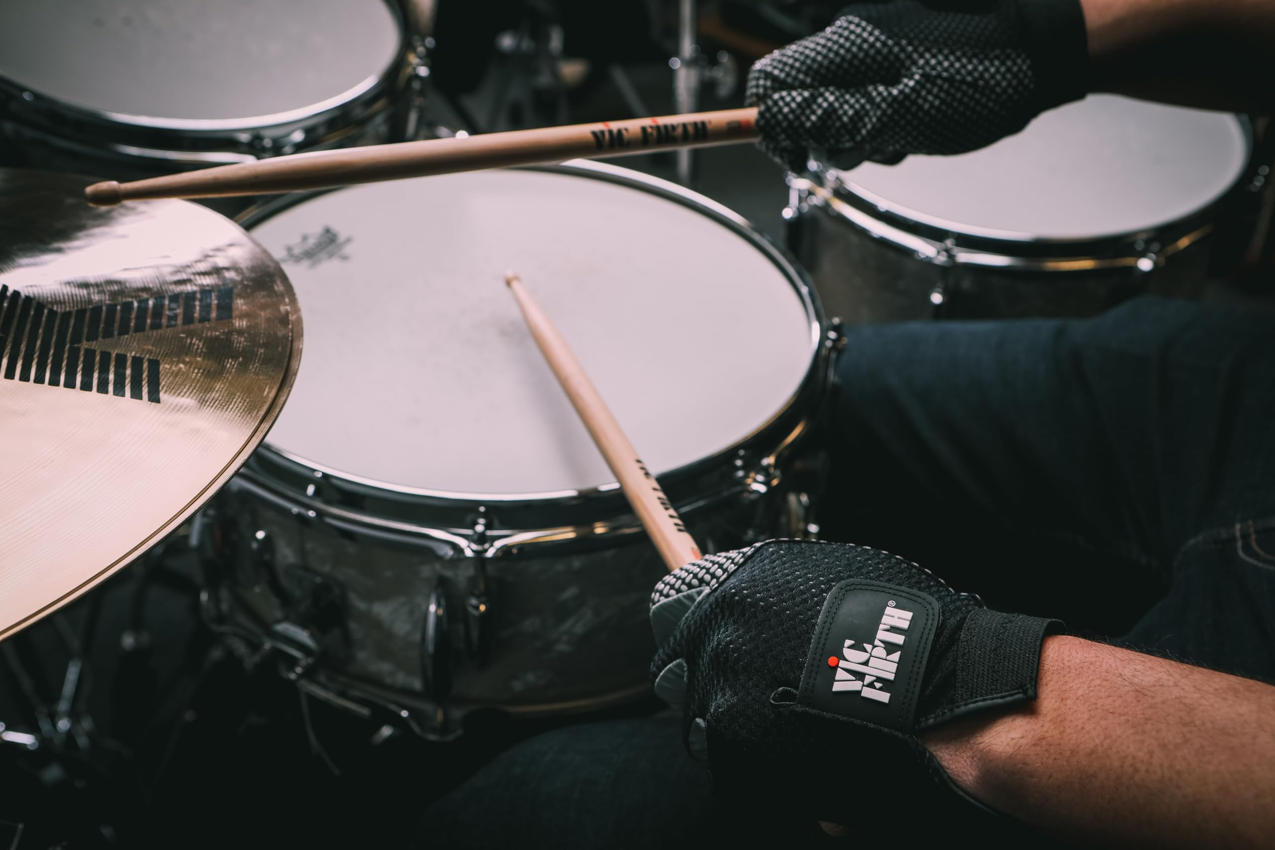 Vic Firth glove worn while playing demonstrating enhanced grip and preserved stick feel