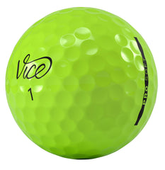 Vice Golf ball in flight against sky highlighting neon lime visibility and stable trajectory
