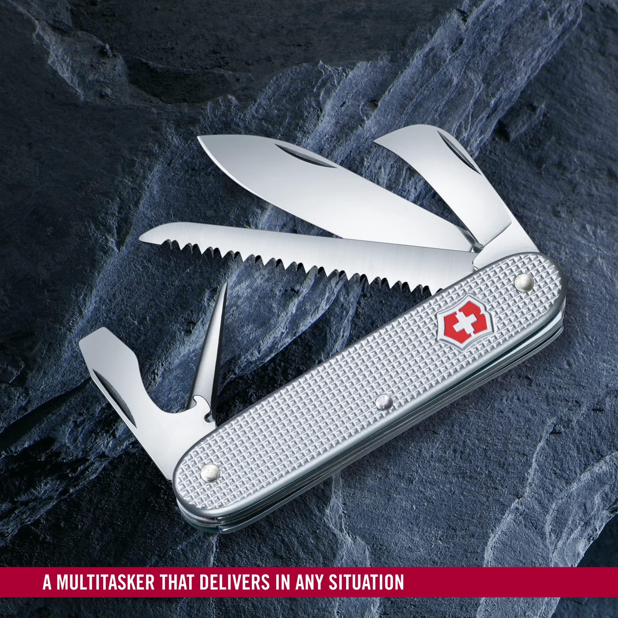 Victorinox Alox opened to display blade, saw, and reamer for tool clarity