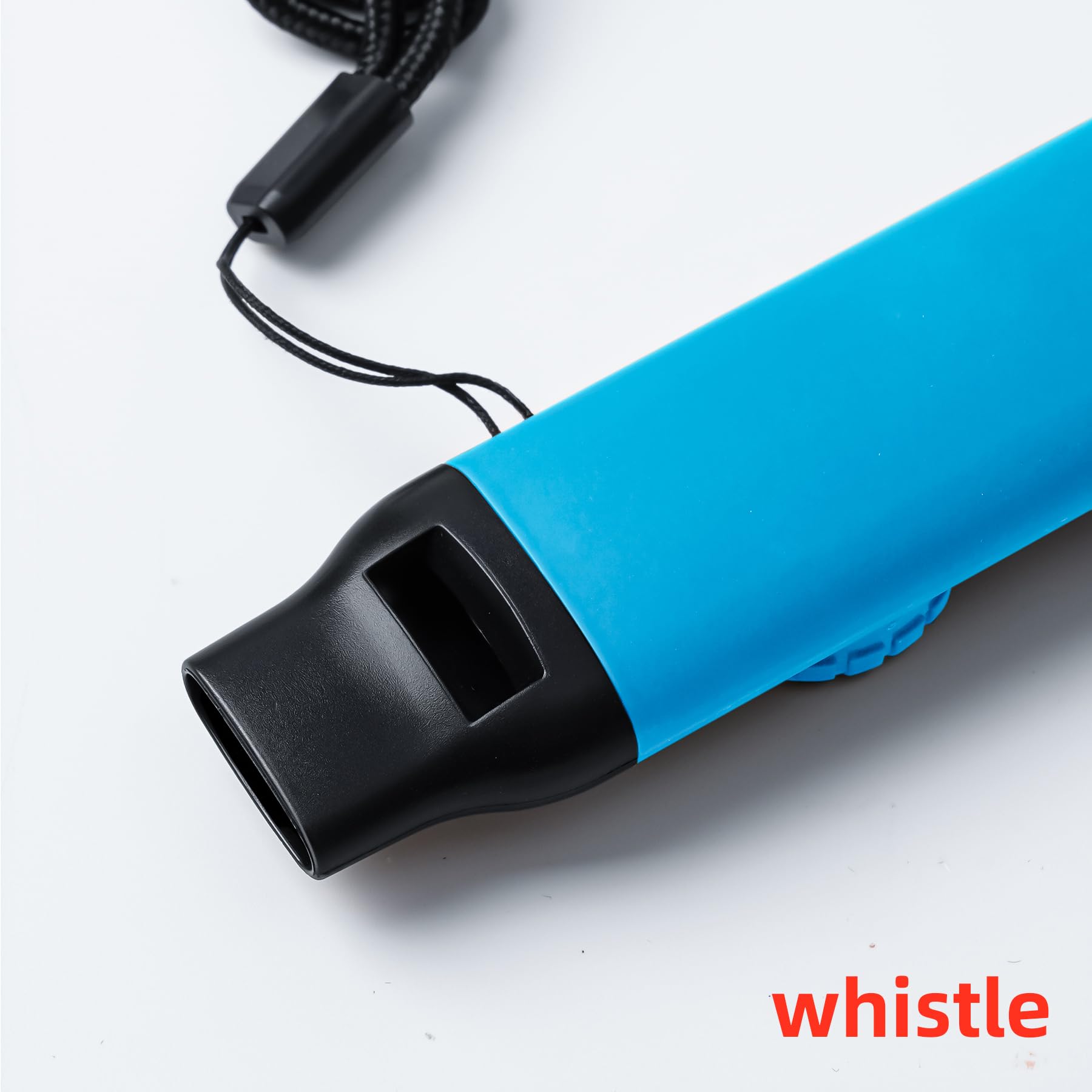 Viriber whistle hanging on lanyard clipped to a kayak for easy access while paddling