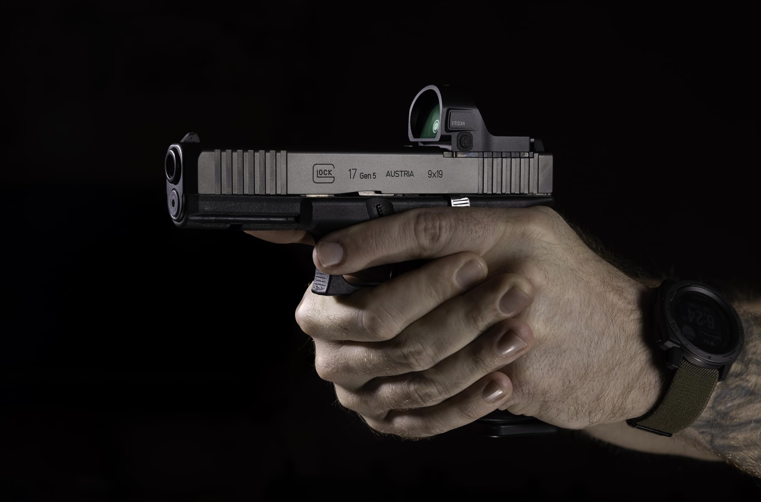 Viridian RFX35 green dot reticle visible through lens for fast target acquisition benefit