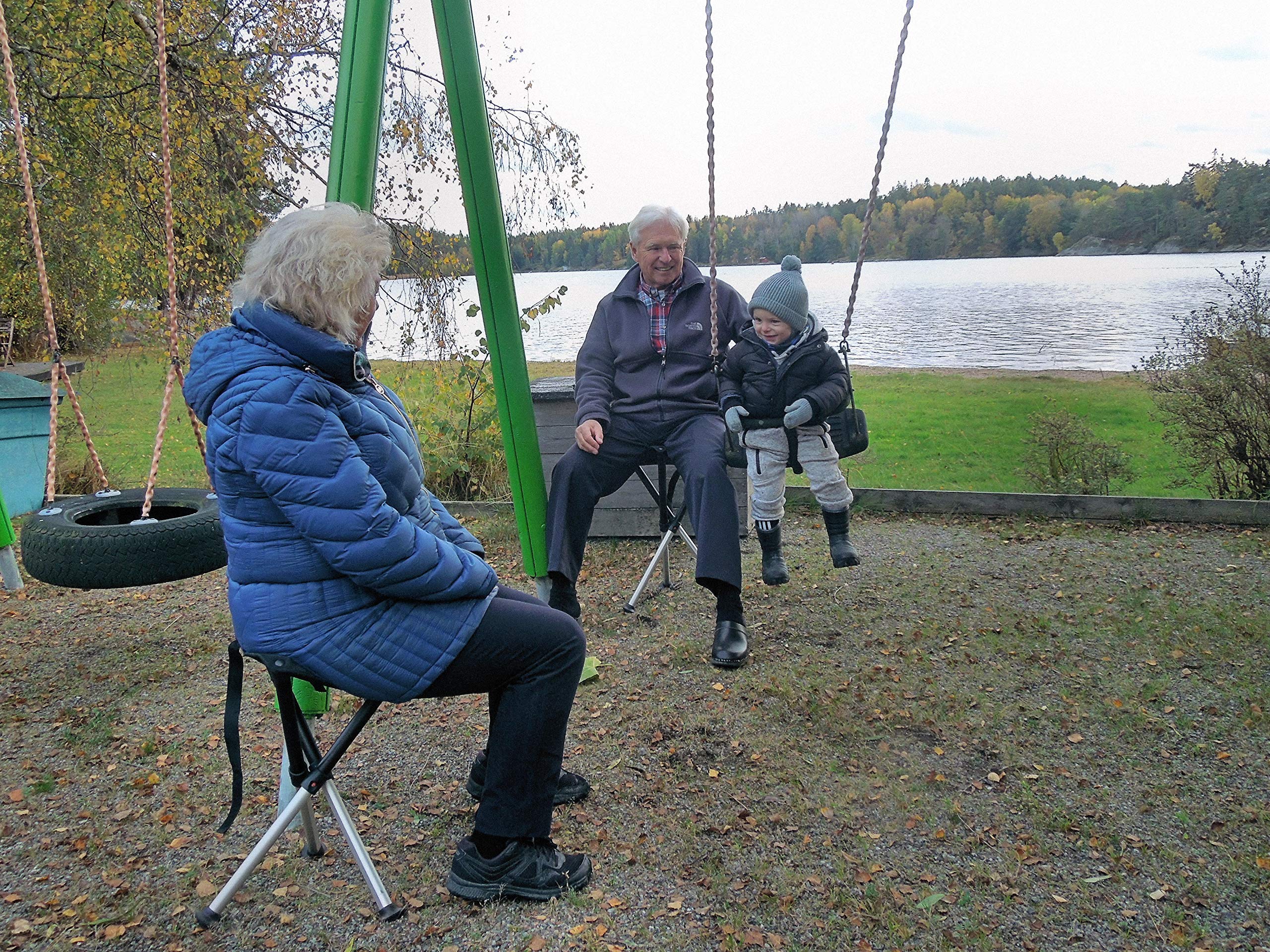 Photographer using Walkstool as portable seat, Walkstool convenience benefit