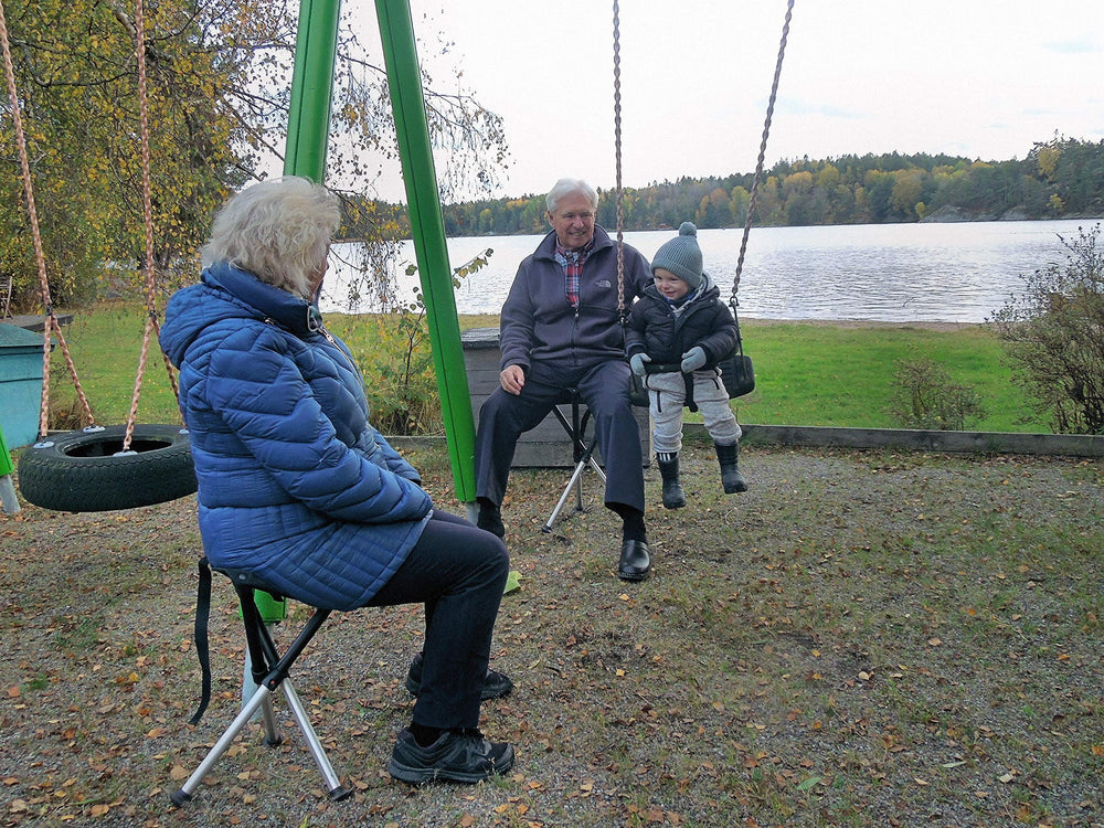 Photographer using Walkstool as portable seat, Walkstool convenience benefit
